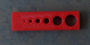 Image of 3D printed object with holes printed vertically (perfect circles)