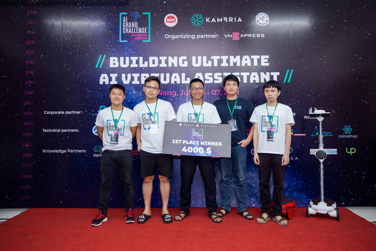 First place hackathon winners posing with their $4000 prize